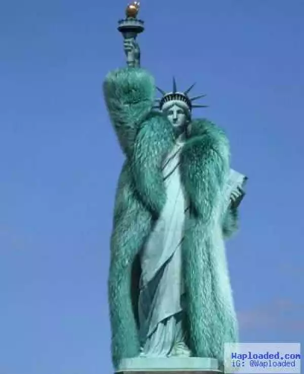 Photo of the iconic Statue of Liberty clothed in fur coat